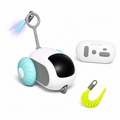 White and teal robot toy with remote control and colorful light accessory on a white background